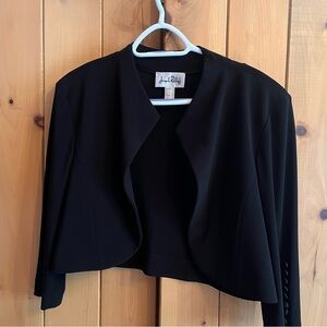 Joseph Ribkoff Black bolero. Light and flowing. Nice detail on the sleeves.